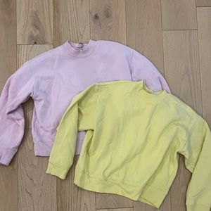 A New Day, two pullovers. Lilac and yellow